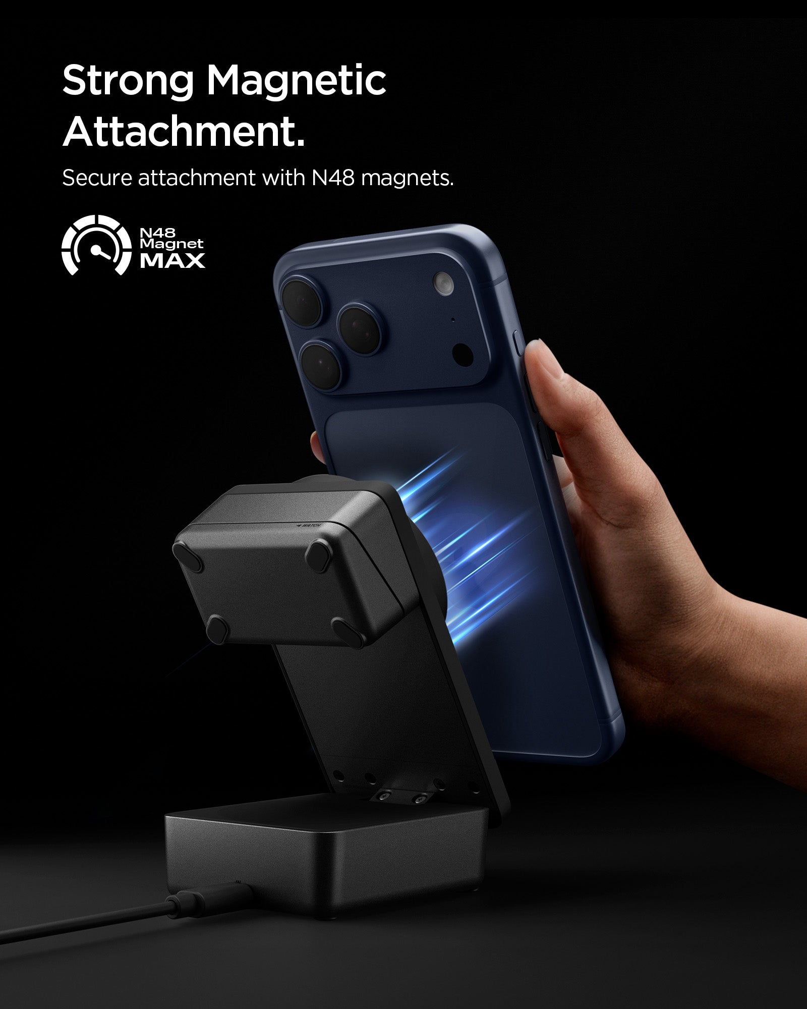 ACH10398 -  Spigen 3-in-1 Fast Wireless Charger showing strong magnetic attachment holding phone securely