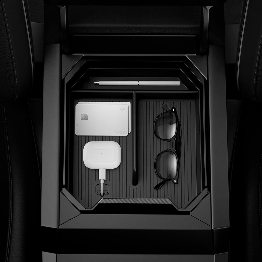 ACP07809 - Tesla Cybertruck Center Console Organizer Tray CO220T in Black showing the top, exposing the inner with multiple stuffs stored inside installed to a center console