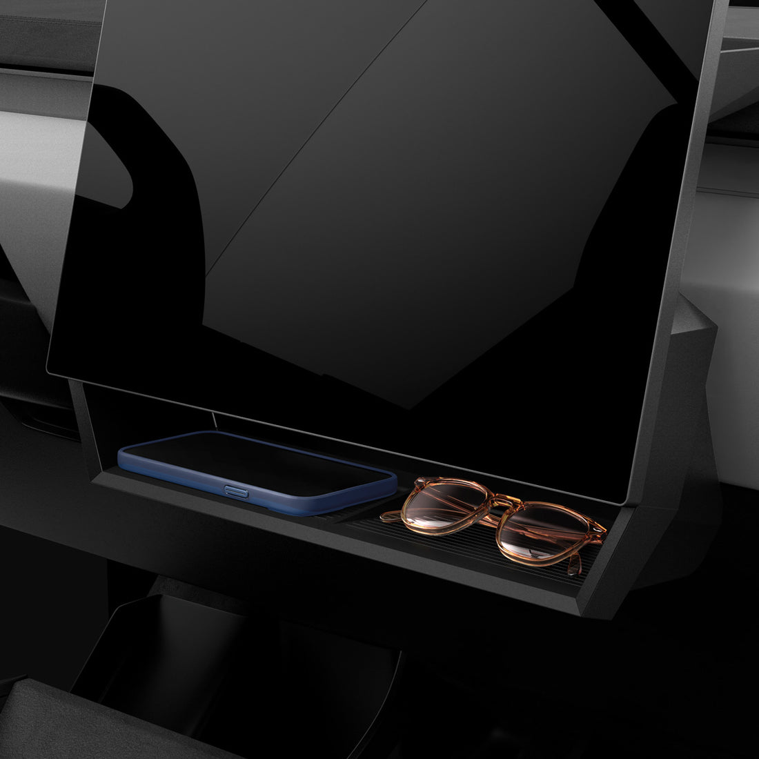 ACP08261 - Tesla Cybertruck Under Screen Organizer CO227 in Black showing the front and partial inner with stuffs inside