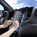 AGL04047 - Dodge Ram Screen Protector GLAS.tR SLIM Anti-Glare showing hands applying screen protector to Ram infotainment display inside truck cabin