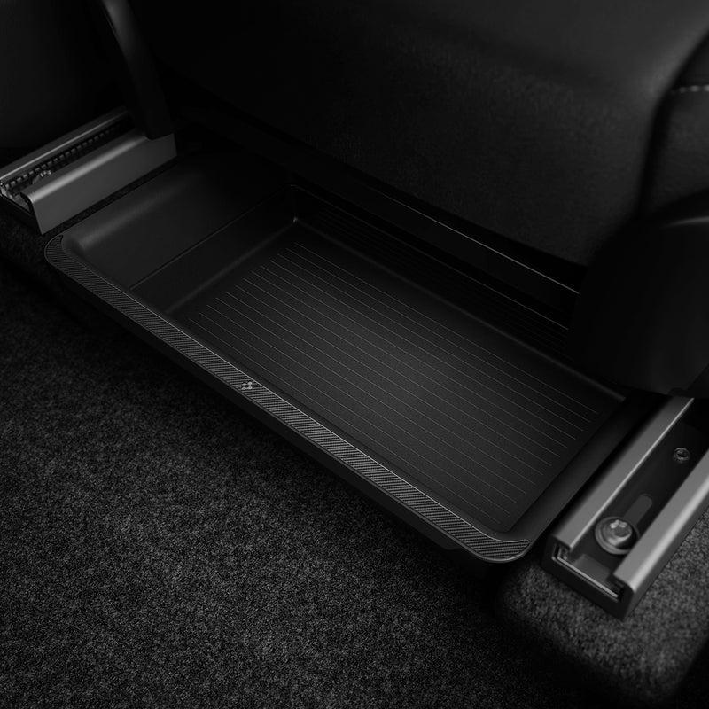 ACP05757 - Underseat Storage Box for Tesla Model Y in black showing top side view inside of car