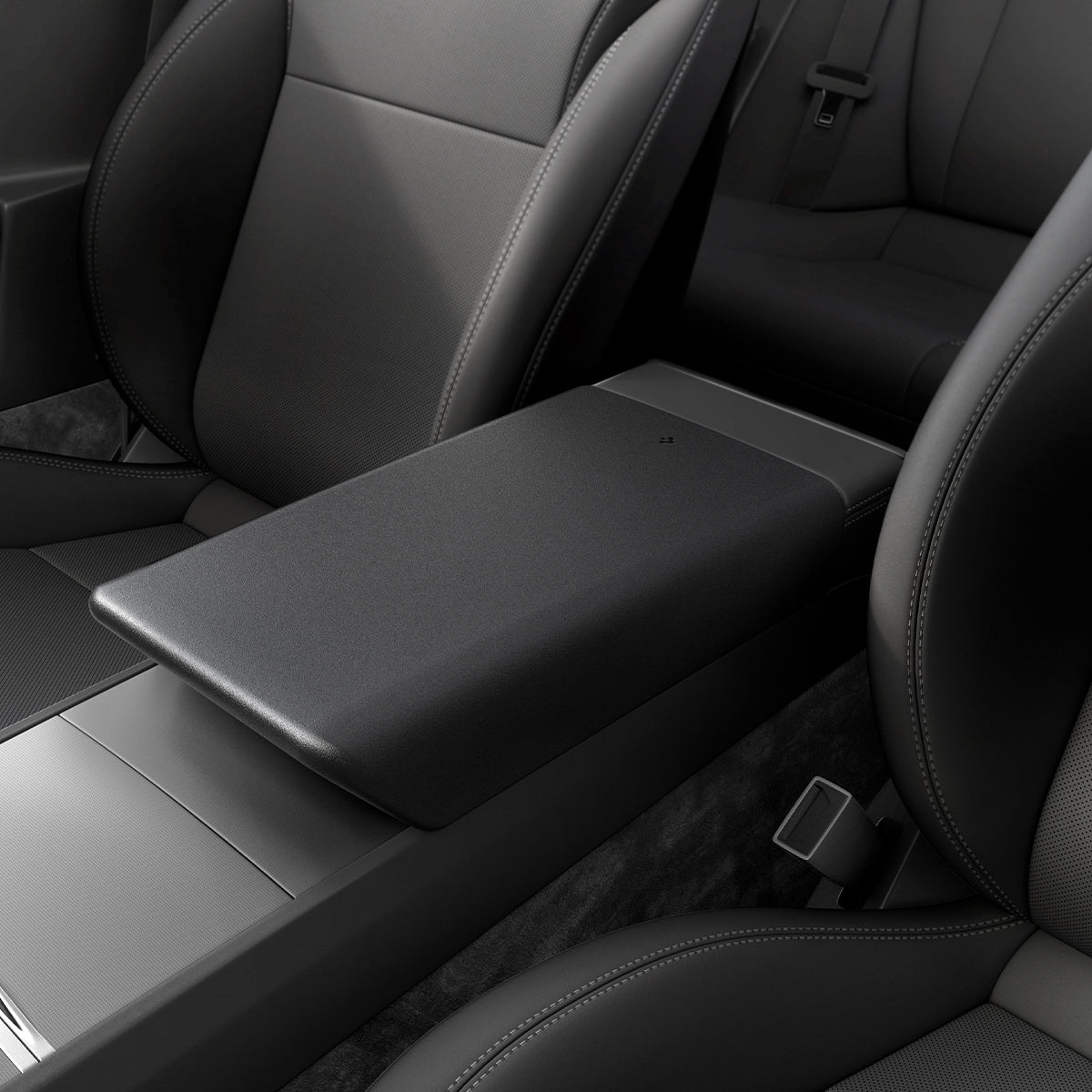 ACP07410 - Model 3 (2024) Armrest Cover TO240H in Black showing the front and partial side of an armrest inside a car