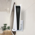 AMP06396 - Playstation 5 Console Mount | VG200 in white showing the side of the console placed on top of a mount attached to a wall