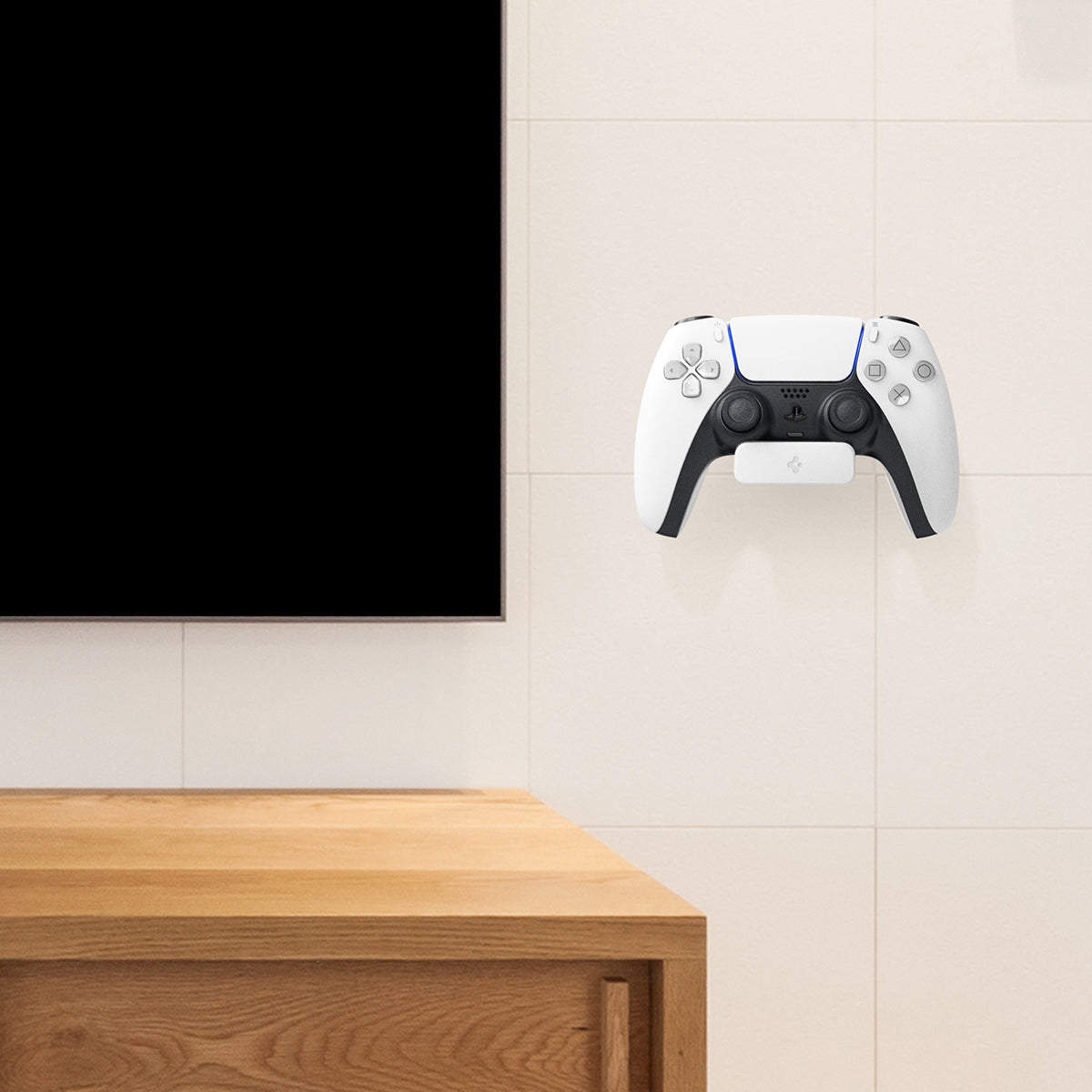 AMP06397 - PlayStation 5 Controller Mount | VG300 in White showing the front of the controller attached to a mount installed on a wall