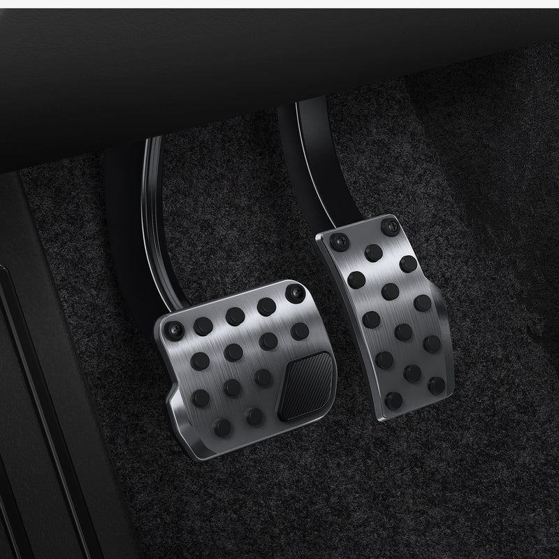 ACP07220 - Tesla Model Y & 3 Pedal Cover TO201 in Black showing the front and partial side of two pedals on full view inside a car