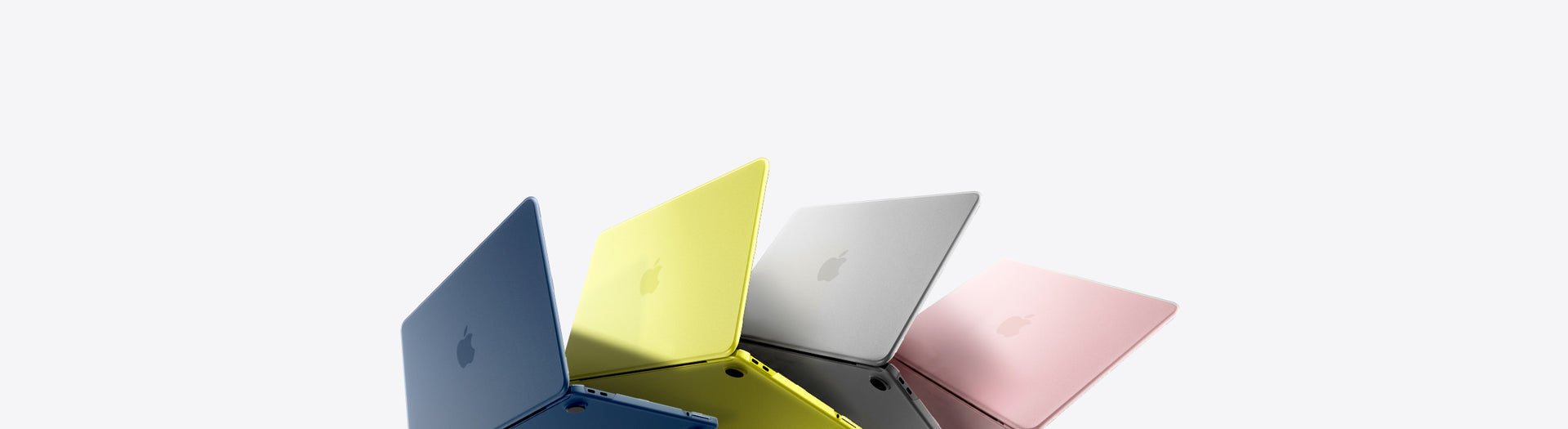 Four various MacBook Neo opened up and fanned out with light grey background