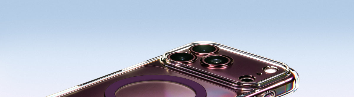 Close-up of a clear Spigen case on a deep cherry iPhone, showing the camera lenses and white MagSafe charging ring