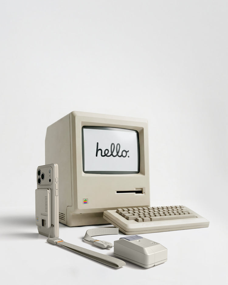 Plain white banner with retro style Mac computer, keyboard, and iPhone Classic LS phone case and Airpods Pro 3 case.