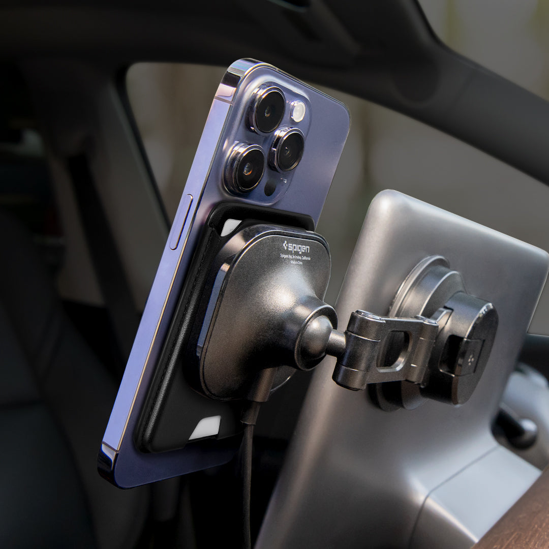 Showing a Spigen Magft Car mount on a tesla screen holding an iPhone.