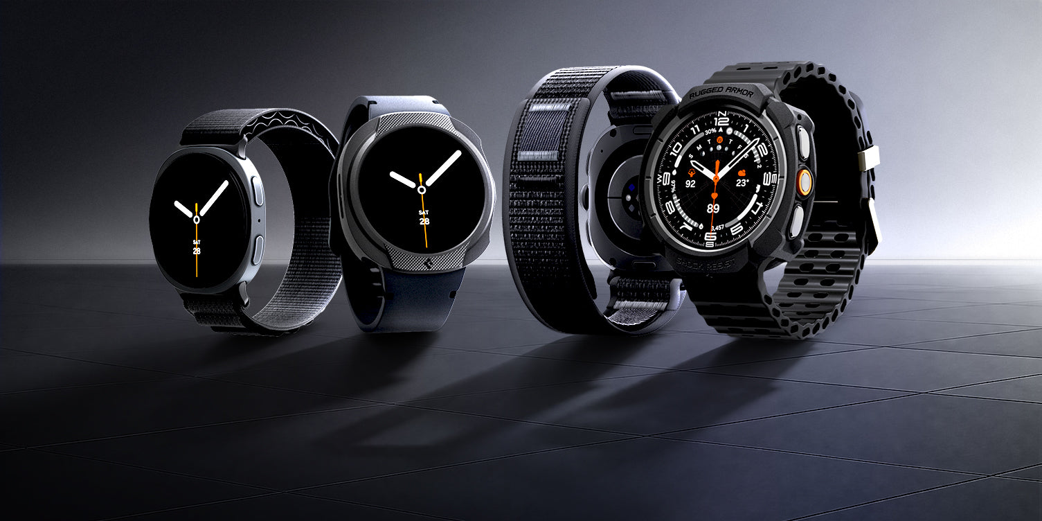 Four Samsung Galaxy Watch models with Spigen cases and bands in various styles on a dark surface