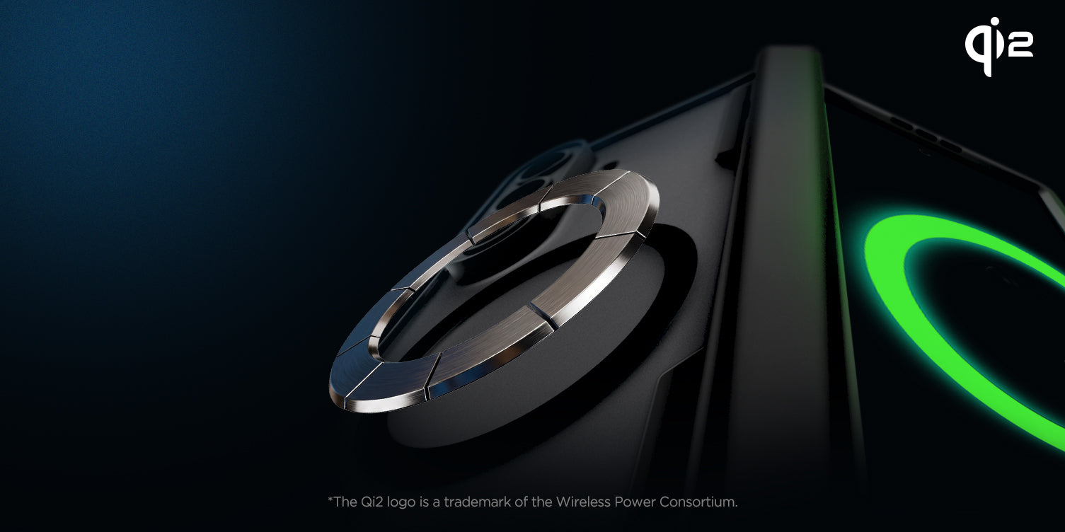 Close-up of Qi2 magnetic charging ring on a black case with green wireless charging glow
