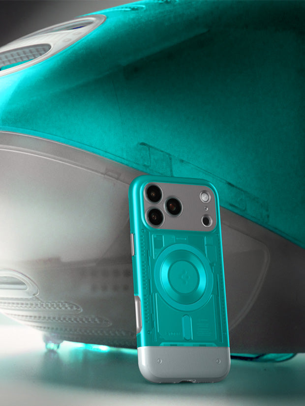 Spigen iPhone 17 Pro Classic case featuring translucent teal retro computer inspired design displayed next to vintage iMac style device