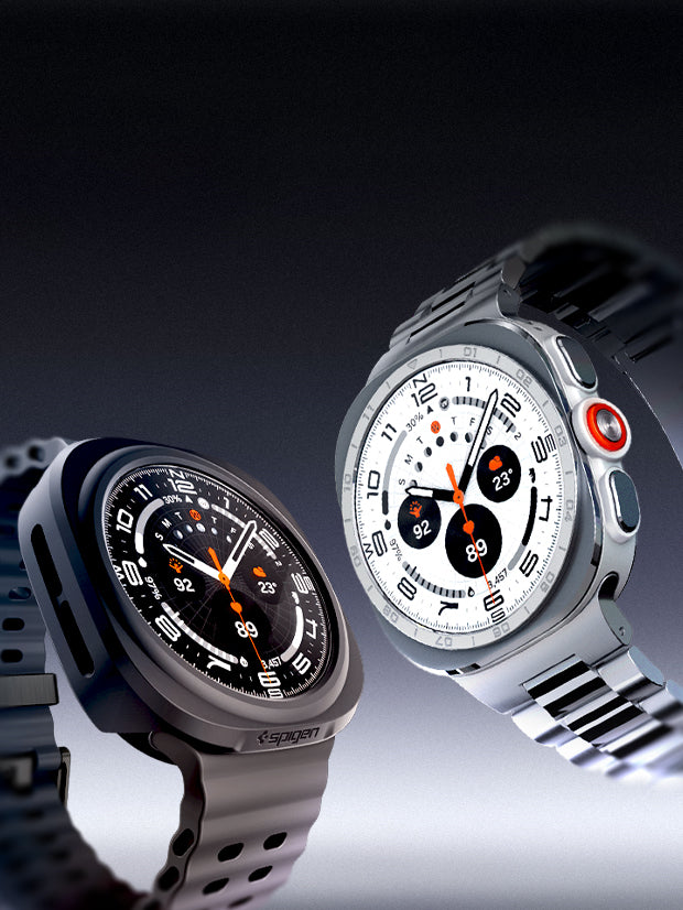 Two Samsung Galaxy Watch Ultra 2 with Spigen cases — one in black with rubber band, one in silver with metal band