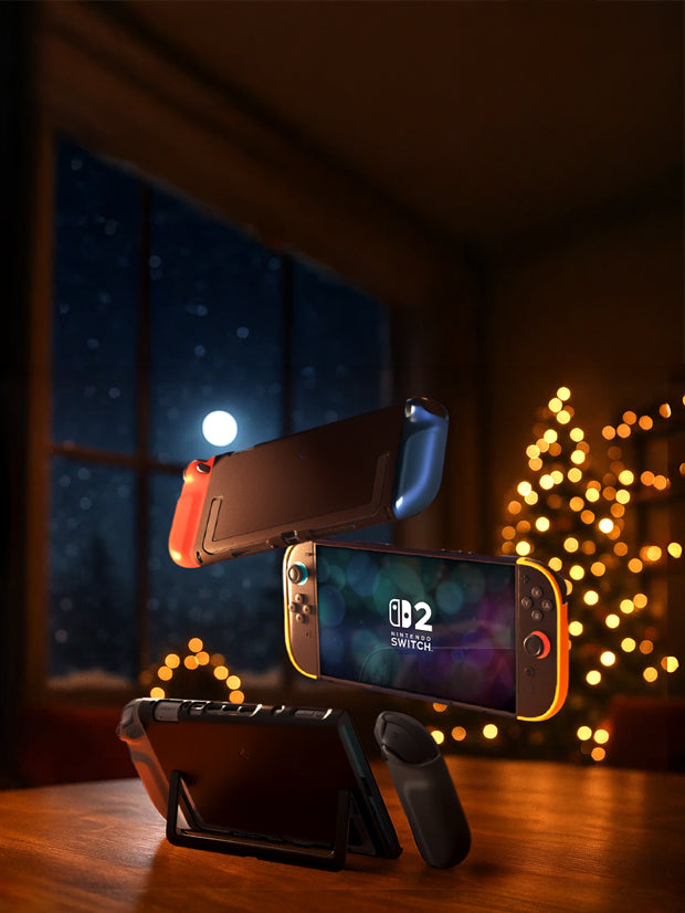 Showing the front and back view of the Nintendo Switch 2 with a Christmas tree blurred out in the background