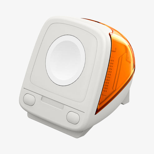 A white and orange computer shaped Apple Watch charging stand