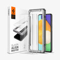AGL02821 - Galaxy A52 Alignmaster Full Cover showing the 2 glass screen protector aligned with an  installation tray and a device beside it, is a packaging