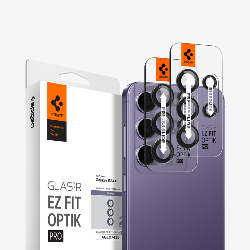 AGL07435 - Galaxy S24 Plus Optik Pro EZ Fit Lens Protector in Violet showing the camera lens protector hovering above another lens protector tray and device showing back, behind it, is the packaging