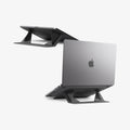 AMP11115 - Slim Fold Laptop Stand | Non-Adhesive LD201-S6 showing MacBook laptop propped up with laptop stand