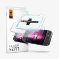 AGL07615 - Lenovo Legion Go GLAS.tR EZ Fit in Clear showing the front of the alignment tray hovering in front of a screen protector and a device and behind it, another set of alignment tray, screen protector and a device with the packaging