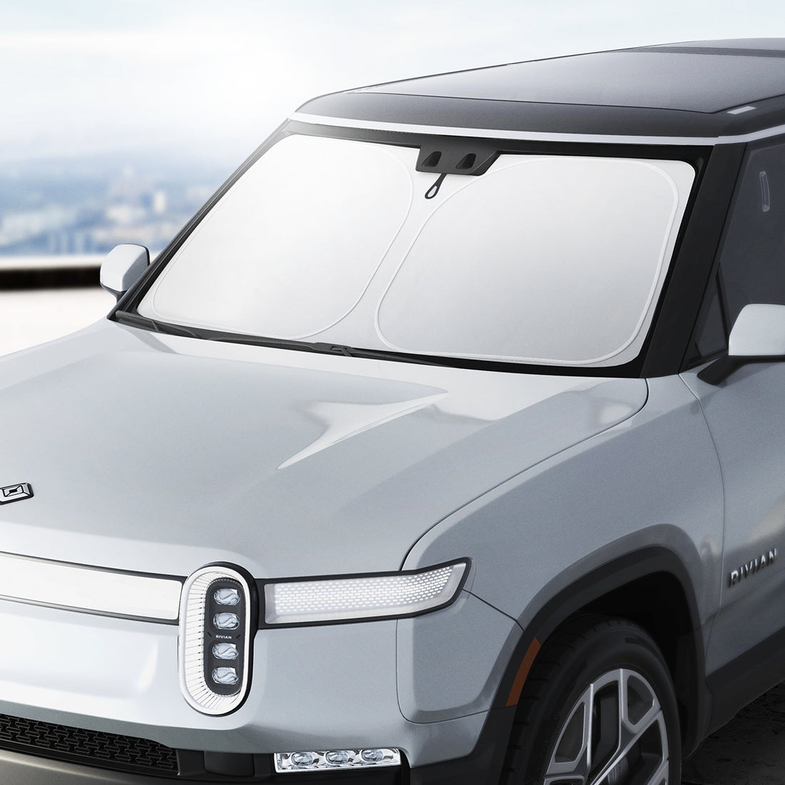 ACP09093 - R1S (2022-2025) Rivian CryoShade RO260 in Black showing the front the vehicle with installed shade inside
