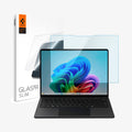 AGL08632 - Microsoft Surface Laptop 13.8-inch (2024) Glas.tR SLIM showing the screen protector hovering in front of the device and the packaging
