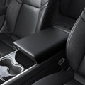 ACP06042 - Tesla Model 3 & Y Armrest Cover in black showing the cover installed onto armrest inside of car