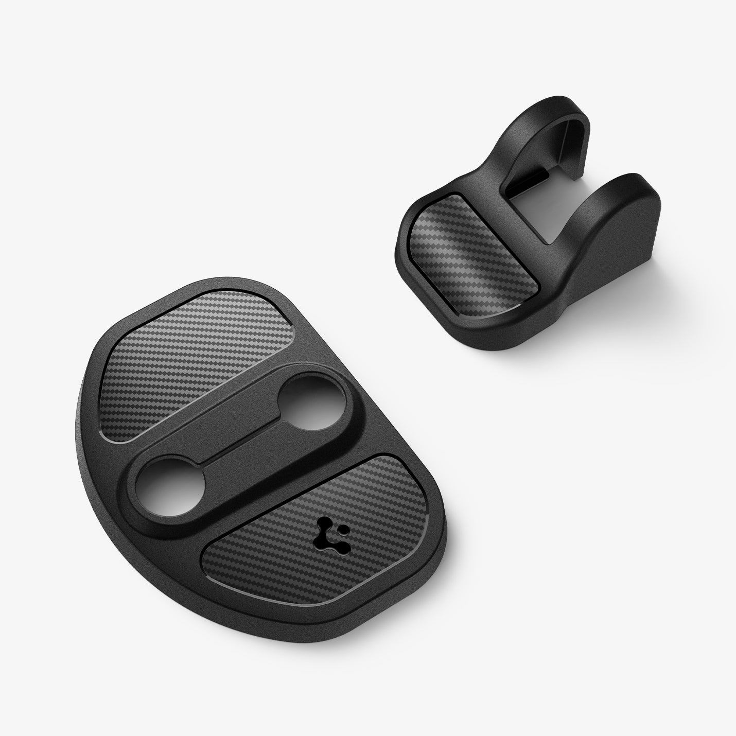 ACP07123 - Tesla Model Y & 3 Door Lock Cover TO320 in Black showing the front of two types of lock covers on a flat surface
