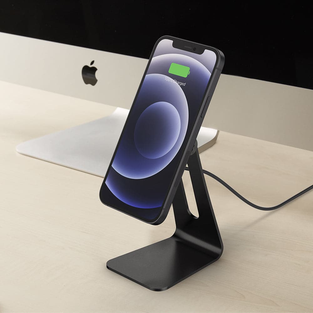 ACH02574 - OneTap Pro Wireless Magnetic Charging Stand (MagFit) in black showing the front with device connected and stand in front of iMac