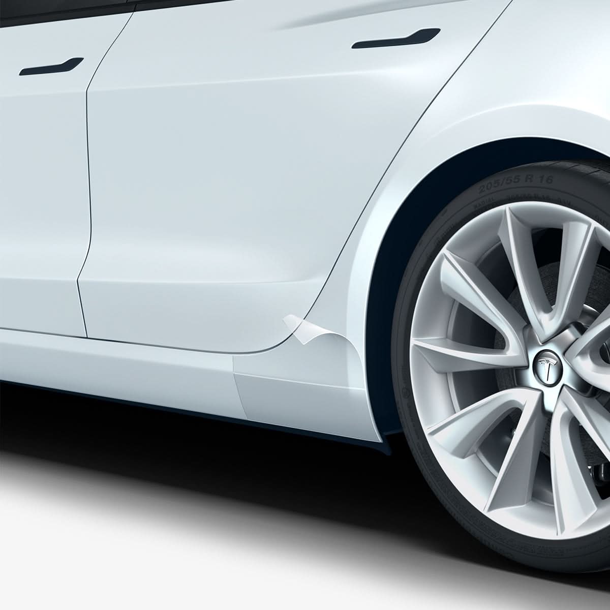 AFL06195 - Tesla Model 3 Platinum Shield Fender showing the shield peeling off slightly from car fender