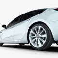 AFL06195 - Tesla Model 3 Platinum Shield Fender showing the side bottom view of shield on car fender