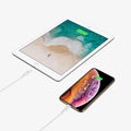 000CA25416 - DuraSync USB-C to Lightning Cable in white showing the two chargers charging a phone and tablet