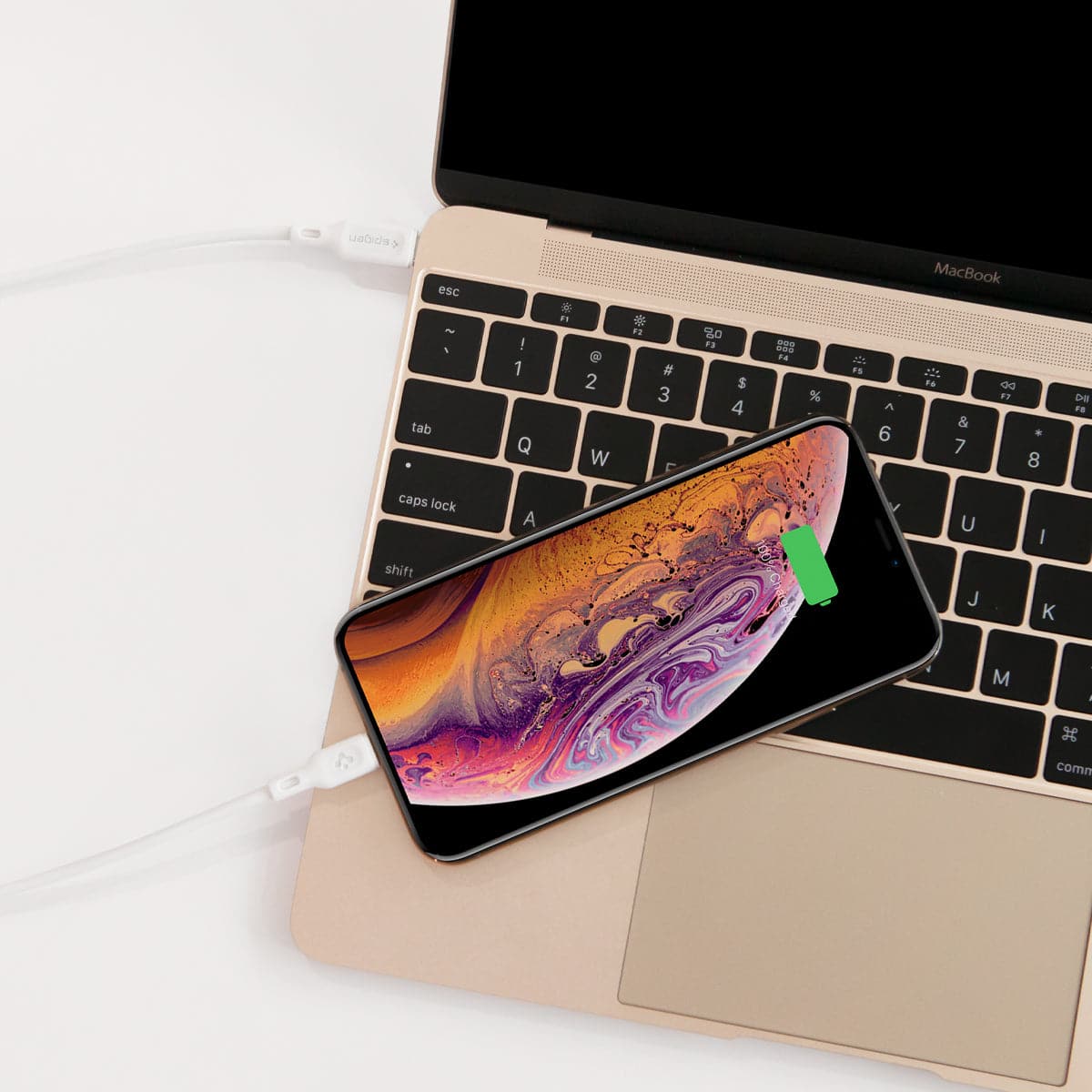 000CA25416 - DuraSync USB-C to Lightning Cable in white showing the charger connected to laptop charging a phone