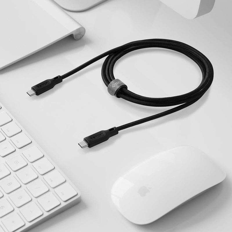 000CA25702 - DuraSync USB-C to USB-C 2.0 showing the cable organized in a loop on a desk