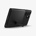 ACS03943 - Galaxy S22 Ultra 5G Case Slim Armor in black showing the back and bottom with device propped up by built in kickstand