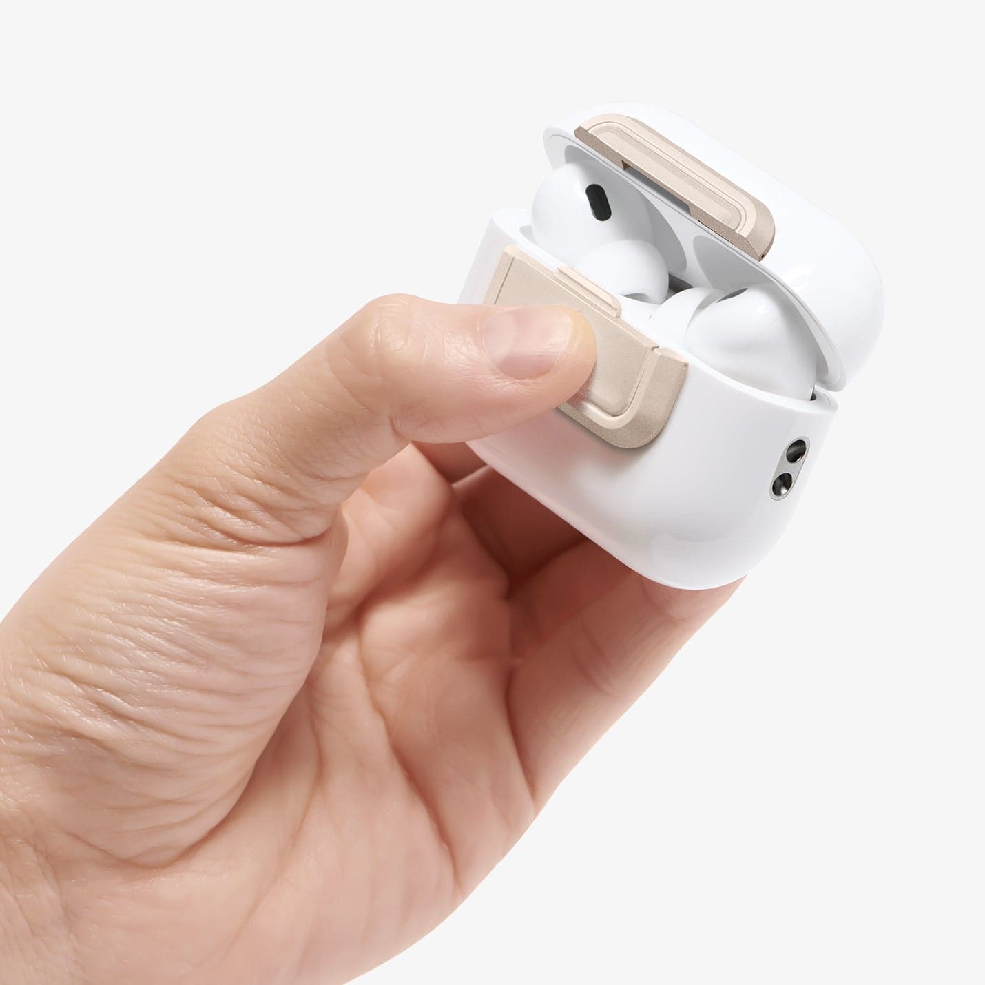 ASD06154 - AirPods Pro 2 Lock Fit M in Starlight showing the AirPods in someone's hand with top open