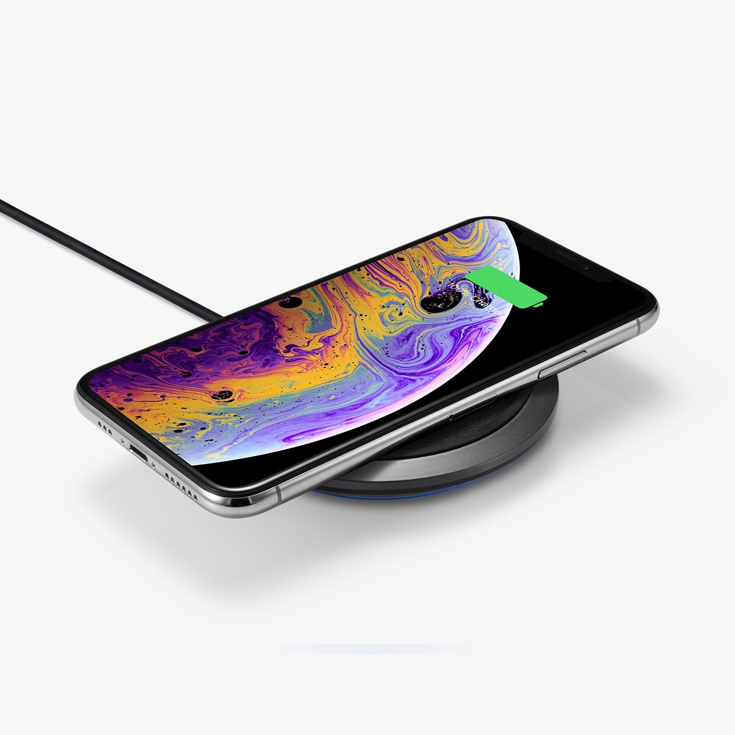 000CH23122 - Essential® Leather Designed 10W Wireless Charger F308W in black showing the top and side with phone on top charging