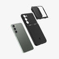 ACS05687 - Galaxy S23 Plus Case Optik Armor in black showing the multiple layers of lens protector and case hovering above device