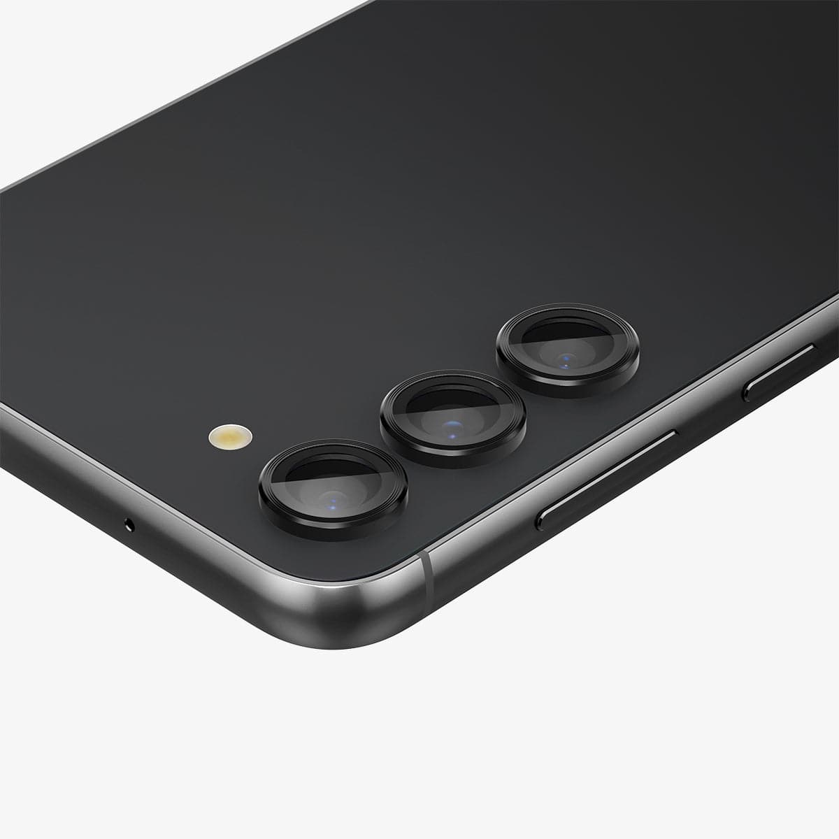 AGL05962 - Galaxy S23 Plus / S23 EZ Fit Optik Pro Lens Protector in black showing the device laying flat and zoomed in on camera lens