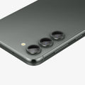 AGL06170 - Galaxy S23 Plus / S23 EZ Fit Optik Pro Lens Protector in green showing the device laying flat and zoomed in on camera lens
