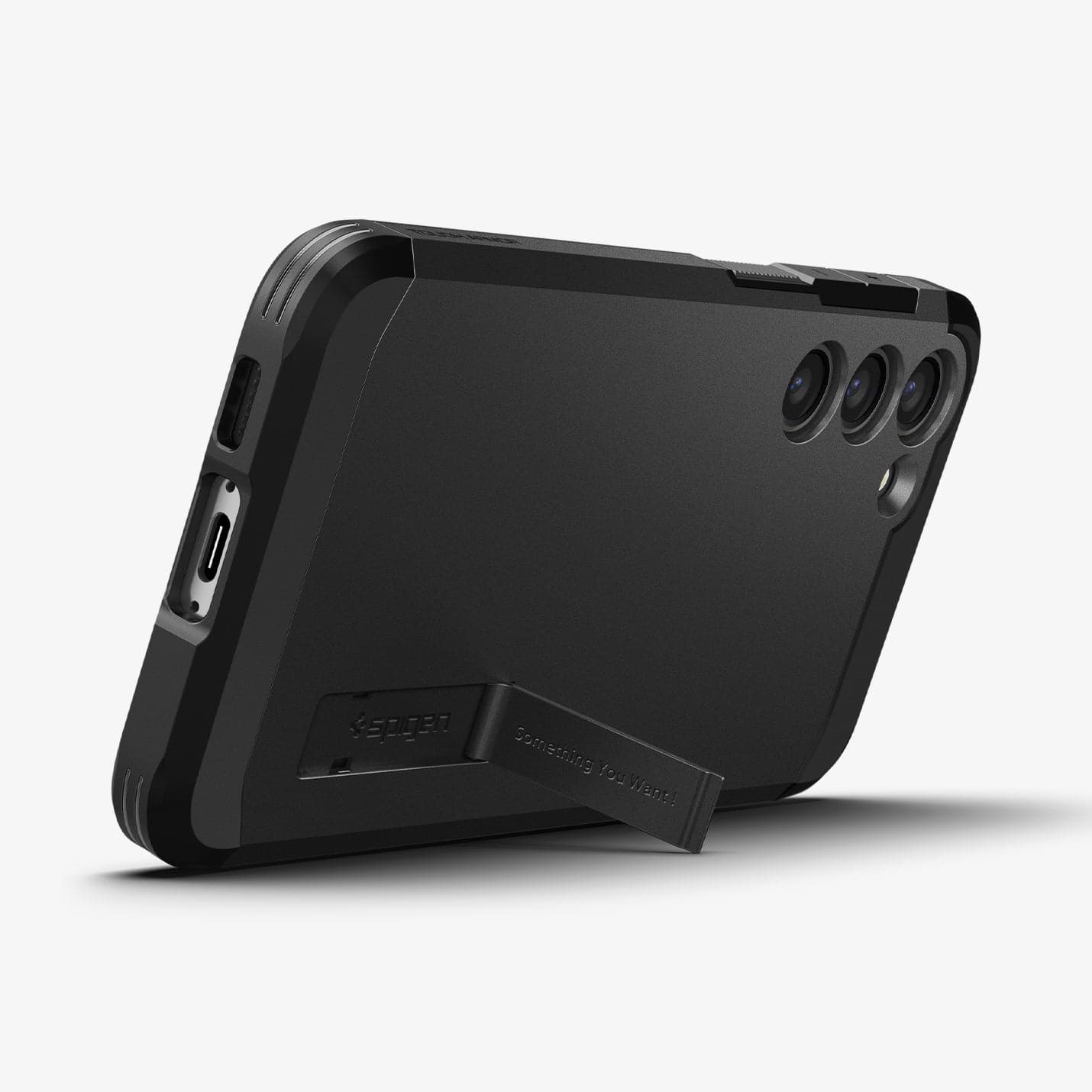 ACS05672 - Galaxy S23 Plus Case Tough Armor in black showing the back and bottom with device propped up by built in kickstand