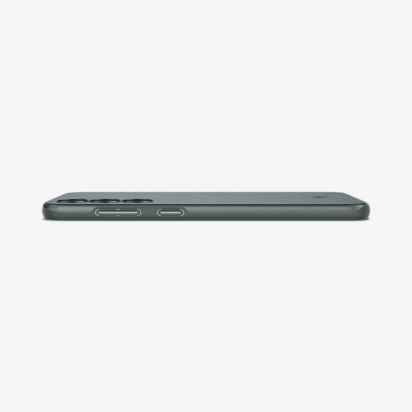 ACS06084 - Galaxy S23 Case Thin Fit in abyss green showing the side and partial back with device laying flat