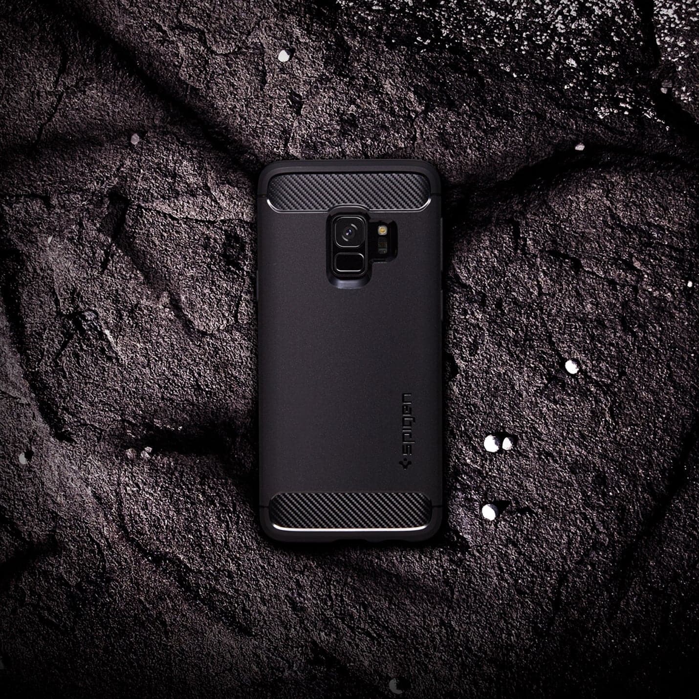 592CS22834 - Galaxy S9 Series Rugged Armor Case in black showing the back with device resting on a rock