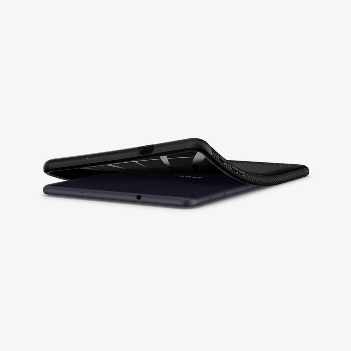 ACS04136 - Galaxy Tab A8 Case Rugged Armor in matte black showing the device laying flat and case bending away from device to show the flexibility