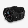 ACS03832 - Galaxy Watch 4 Classic (46mm) Case Rugged Armor Pro in black showing the front and bottom with watch laid on its side