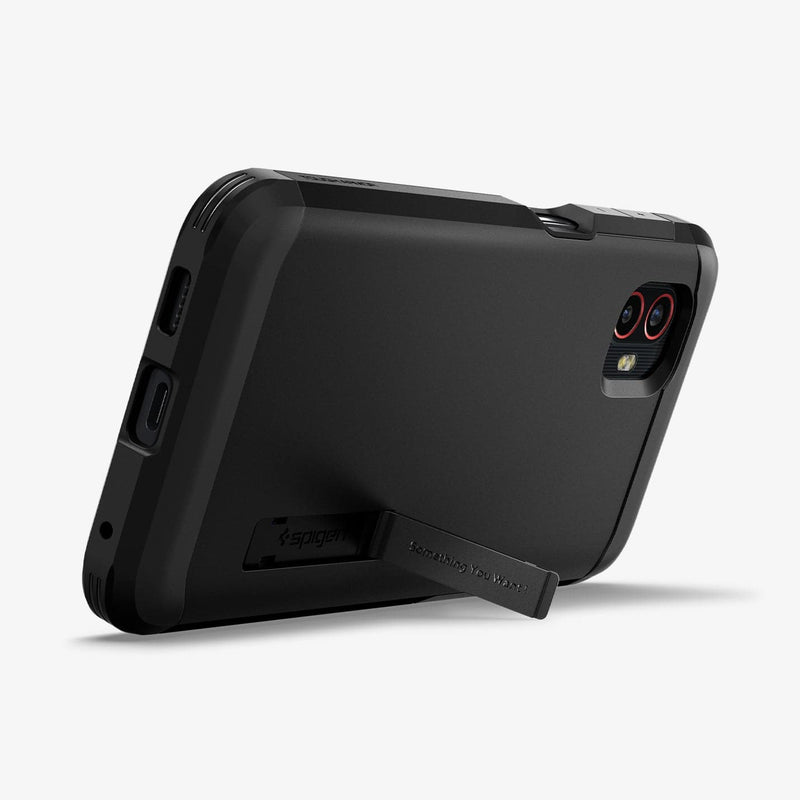 ACS04601 - Galaxy XCover 6 Pro Tough Armor Case in black showing the back and bottom with device propped up by built in kickstand