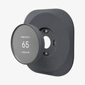 AHP02762 - Google Nest Thermostat Wall Plate in charcoal showing the google nest hovering in front of wall plate
