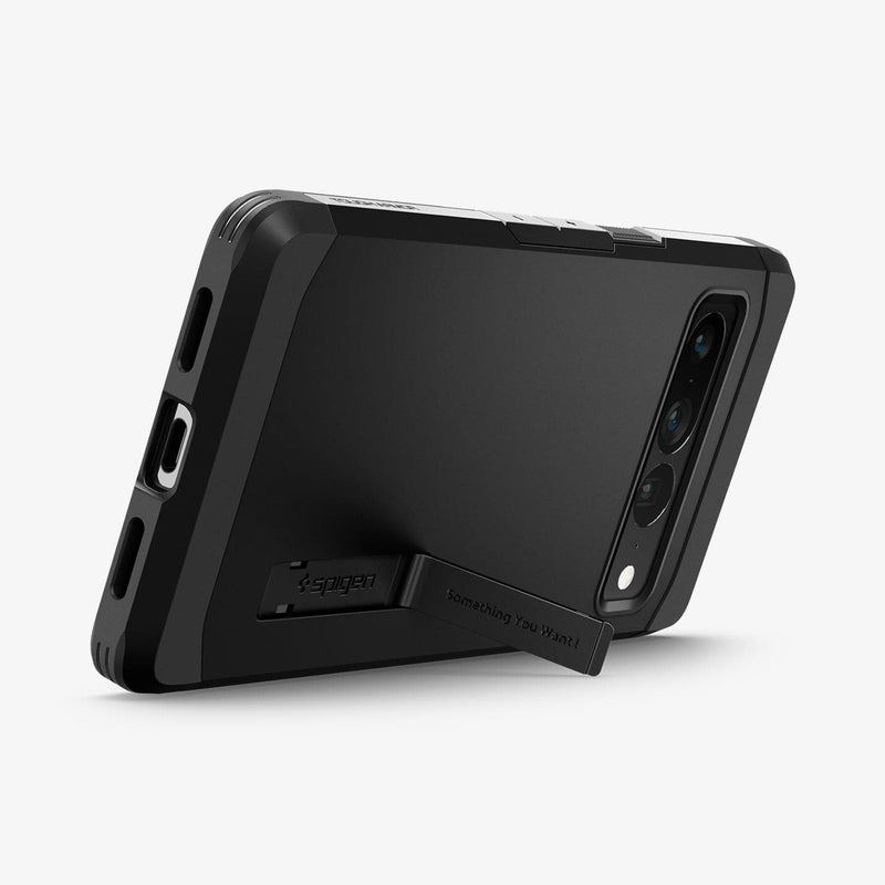 ACS04728 - Pixel 7 Pro Case Tough Armor in black showing the back and bottom with device propped up horizontally by built in kickstand