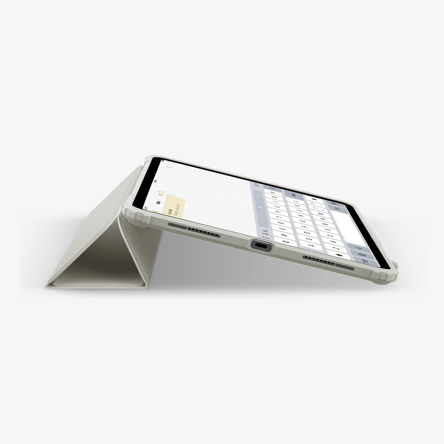 ACS06075 - iPad Pro 11" Case Air Skin Pro in gray showing the bottom and partial front with device propped up by built in kickstand