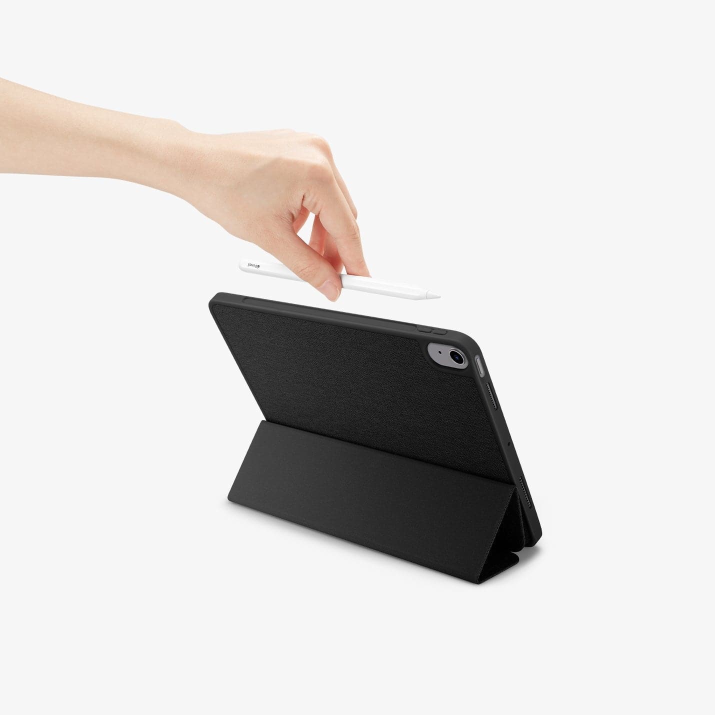 ACS01943 - iPad Air 10.9" Case Urban Fit in black showing the back with a hand placing pen in slot 