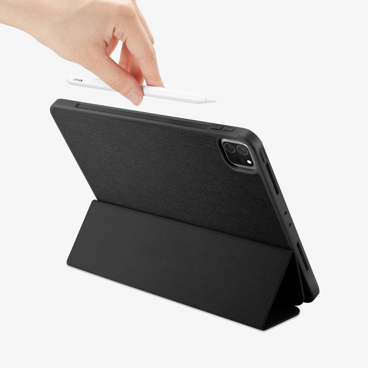 ACS01054 - iPad Pro 11" Case Urban Fit in black showing the back with device propped up by built in kickstand and a hand placing pencil in slot